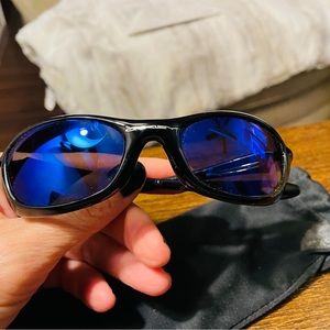 Boys size - XS- Polished Black frame and Blue Iridium lenses.